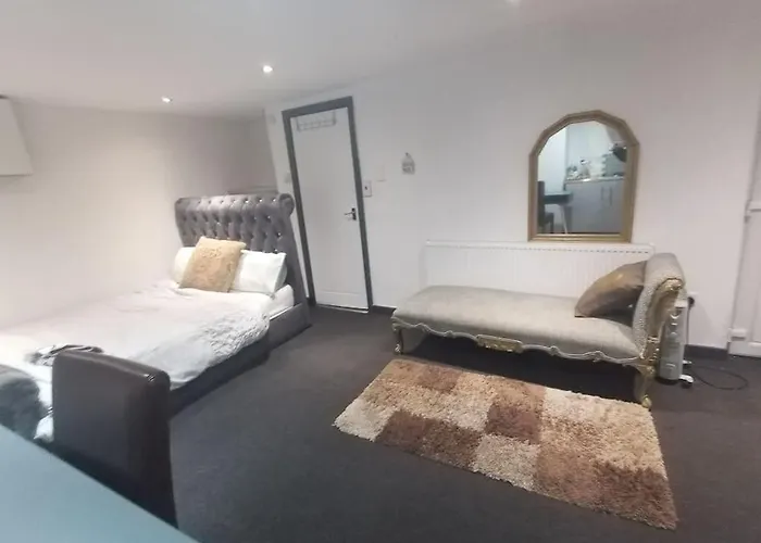 A Cosy Deluxe Size With Queen Size And Sofa Bed